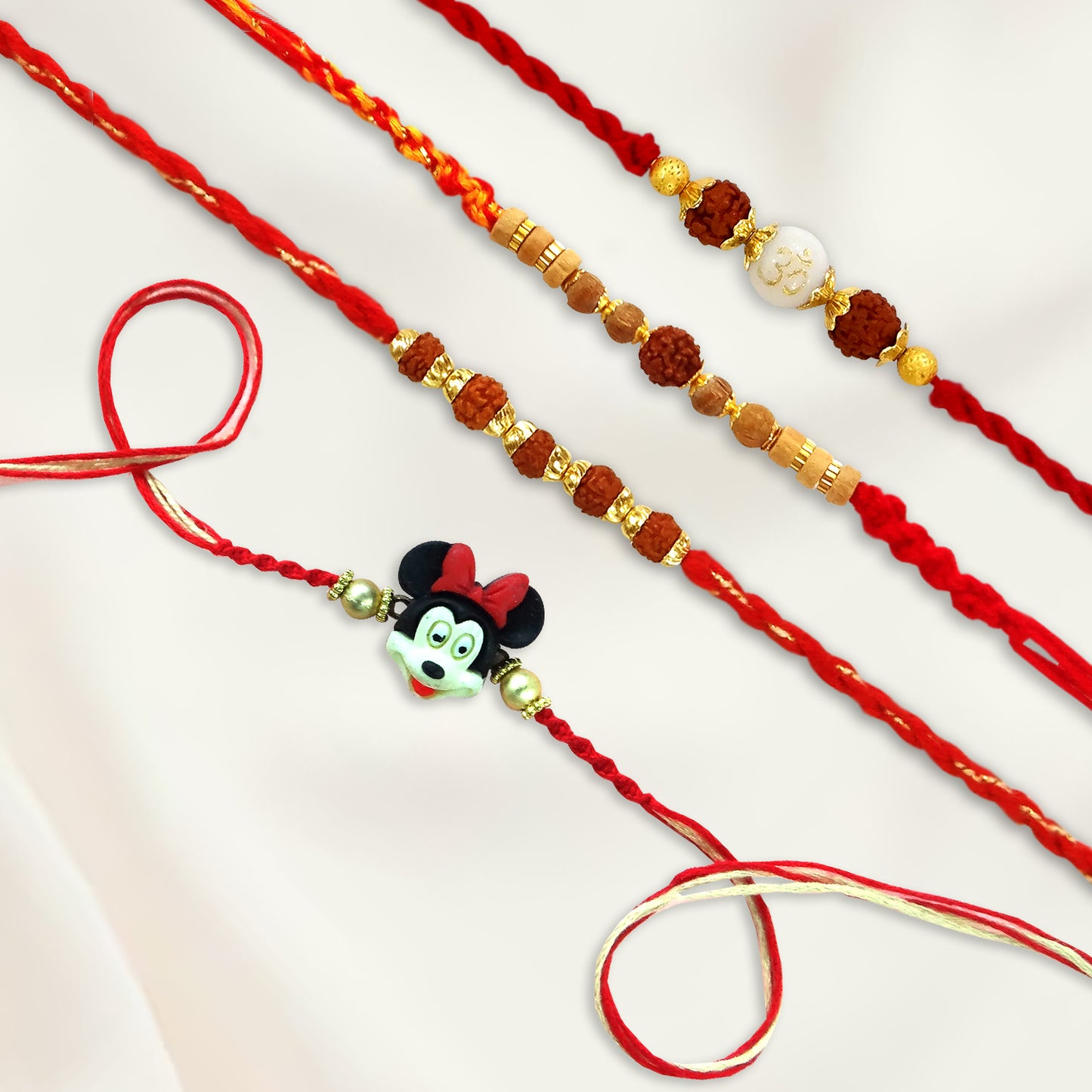 Rakhi Combo Set of 4 – Om Rakhi, Rudraksha & Kids Rakhi for Brothers | 69% Off | Upharkaro-Upharkaro