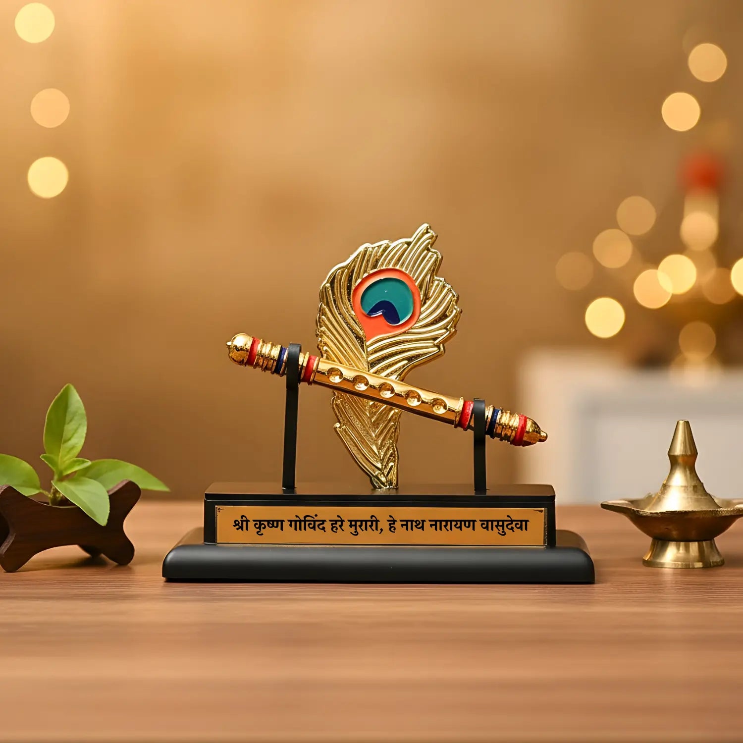 Decorative item with a flute and peacock feather on a stand against a warm background