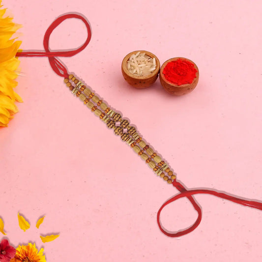 Luxurious Red Dora Bhaiya Rakhi with Golden Beads by Upharkaro-Upharkaro