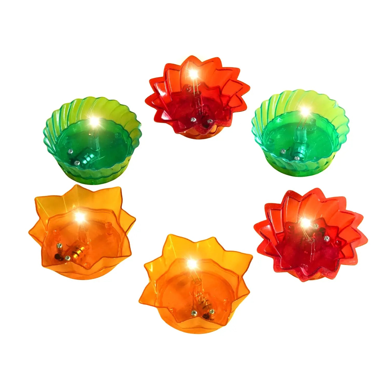 Set of colorful plastic lotus-shaped lights on a white background