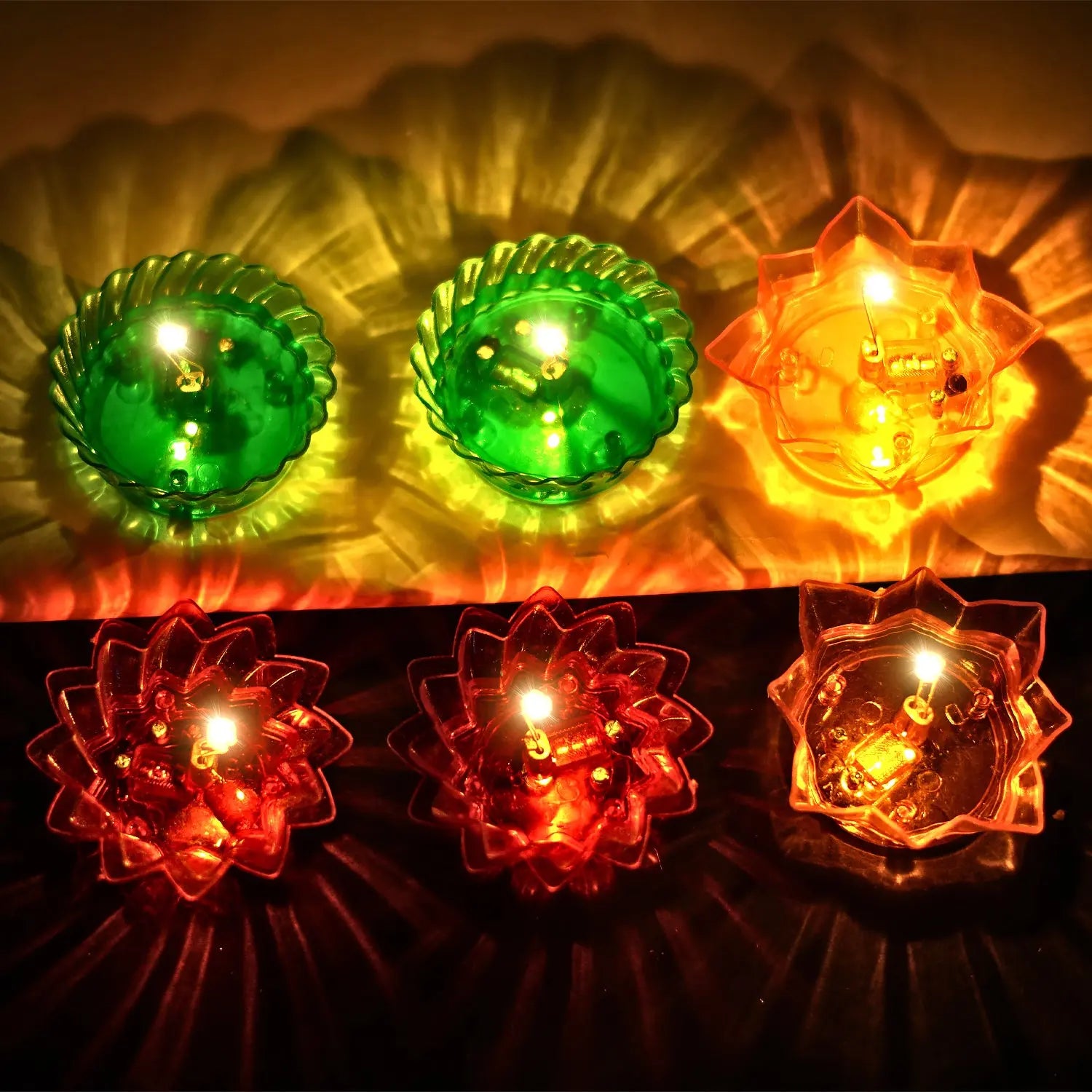 Set of colorful LED candle lights on a dark background