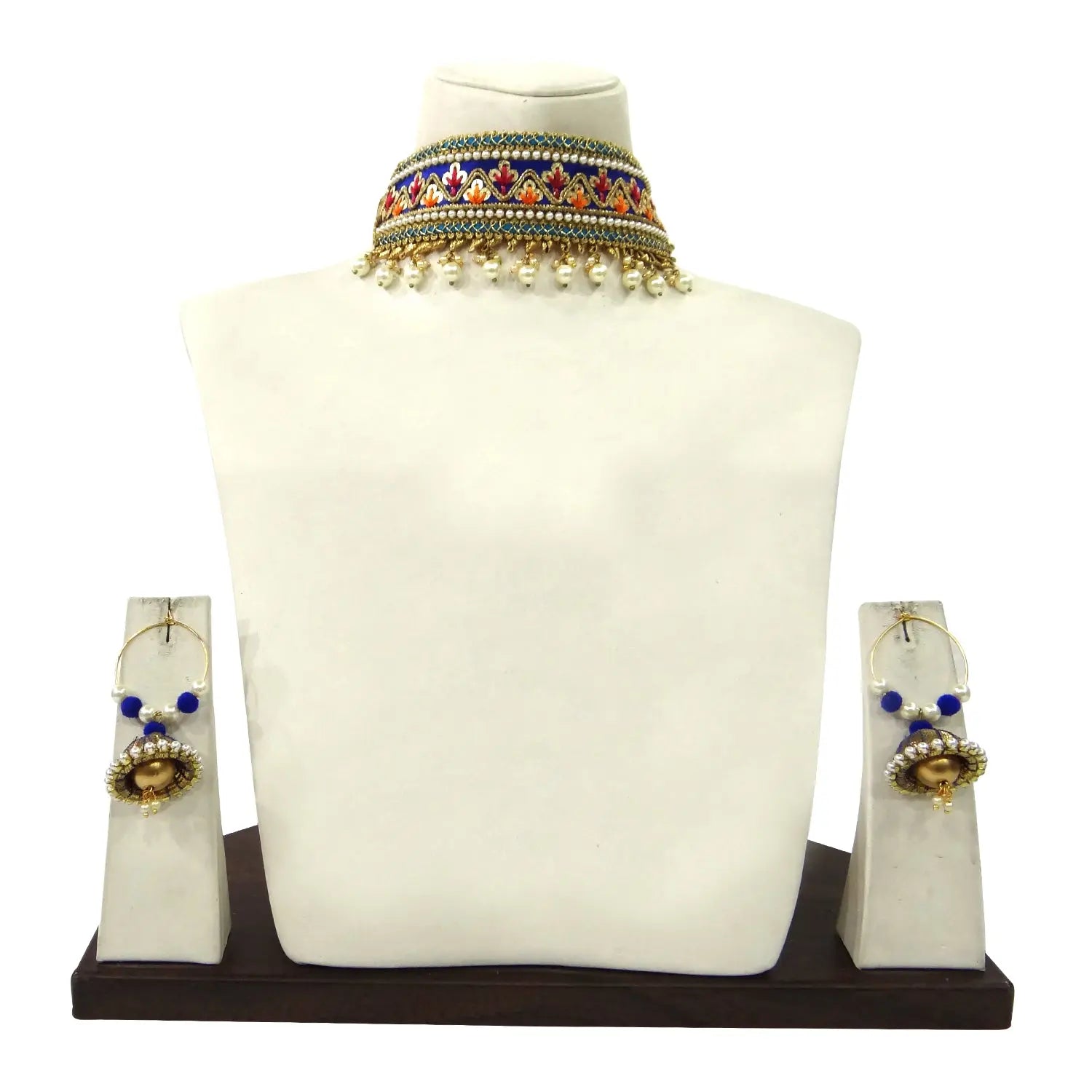 Jewelry set with necklace and earrings on a mannequin bust against a white background