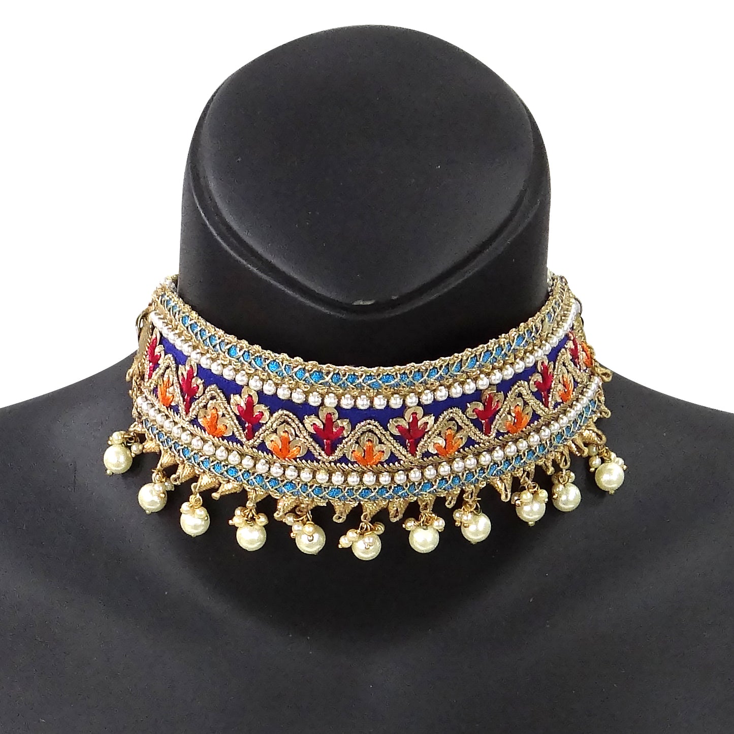 Decorative necklace with colorful stones and pearl-like beads on a black mannequin.