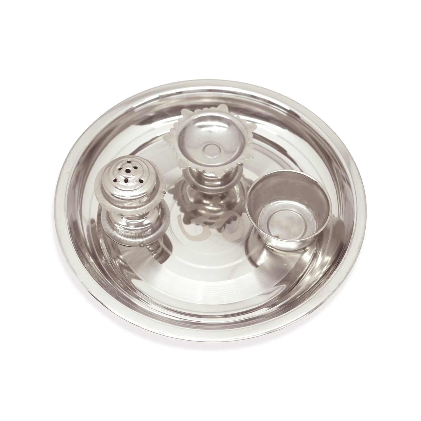 Stainless steel thali with compartments on a white background