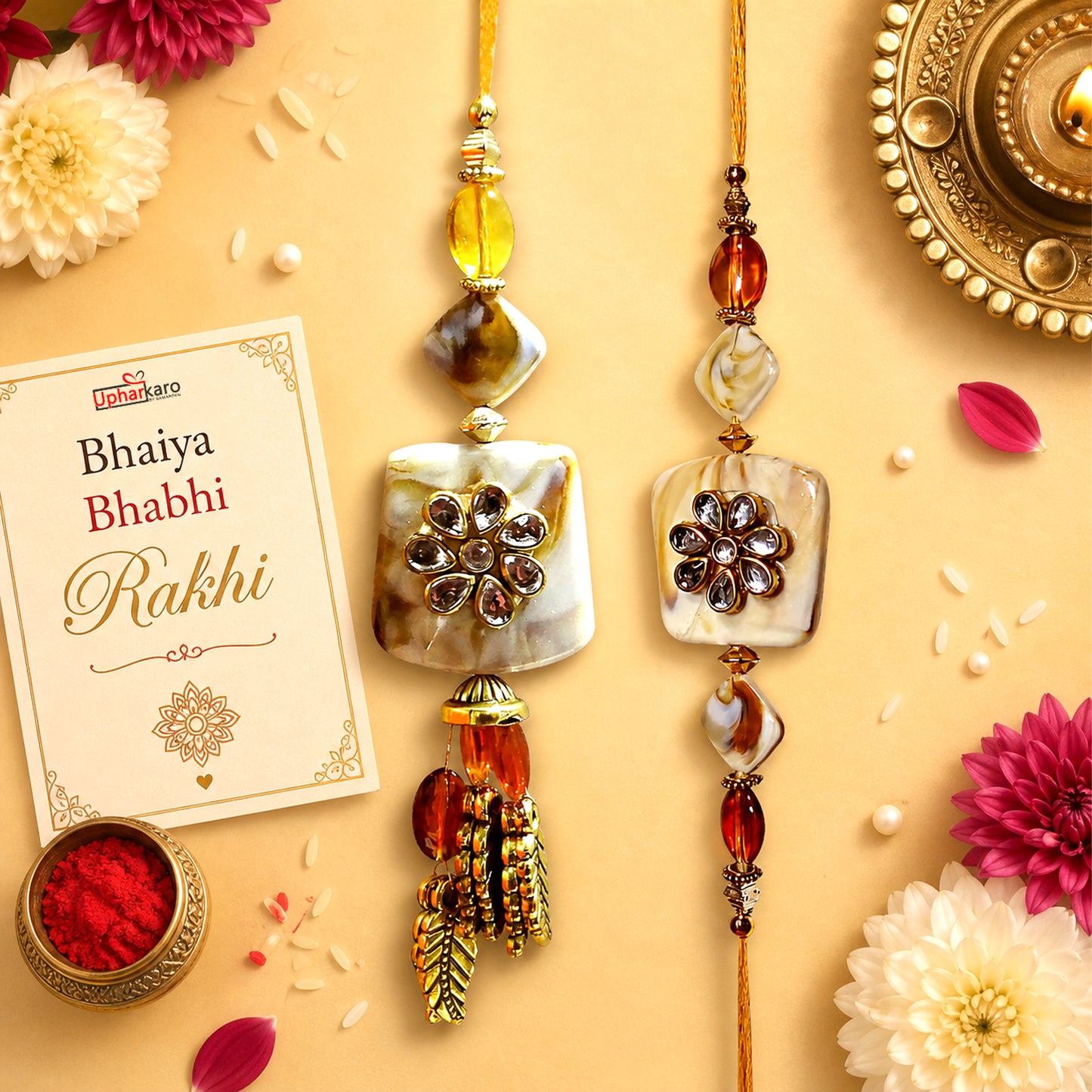 Exquisite Bhaiya-Bhabhi Lumba Rakhi Set with Kundan Flower Design & Golden Tassels By Uphakaro