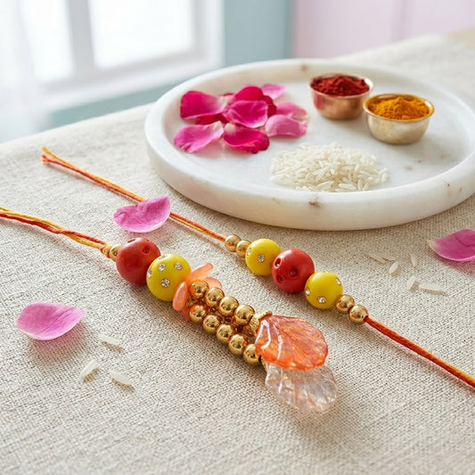 Elegant Pearl & Beaded Bhaiya Bhabhi Rakhi Set with Designer Lumba
