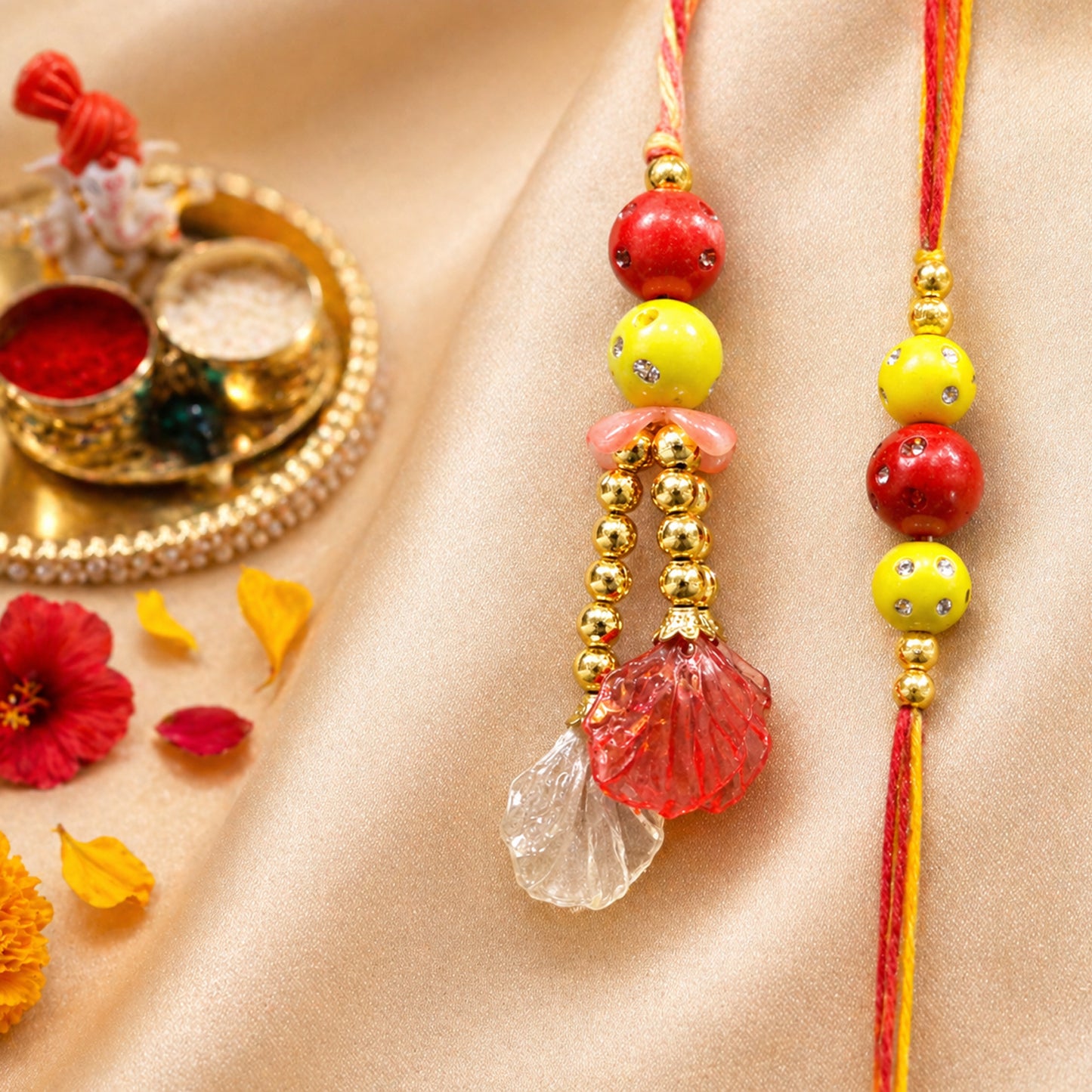 Elegant Pearl & Beaded Bhaiya Bhabhi Rakhi Set with Designer Lumba