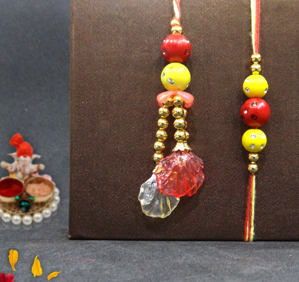 Elegant Pearl & Beaded Bhaiya Bhabhi Rakhi Set with Designer Lumba