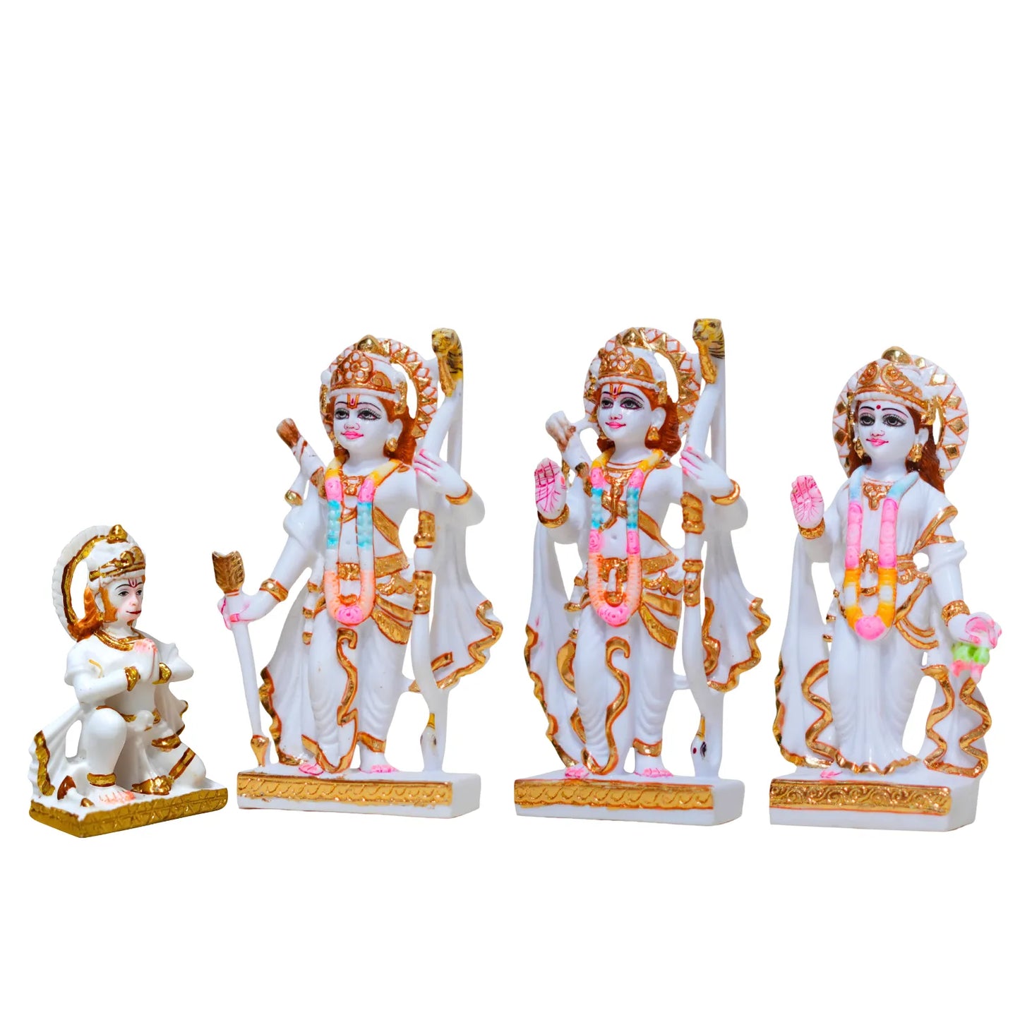 Set of four decorative statues with gold and pink accents on a white background