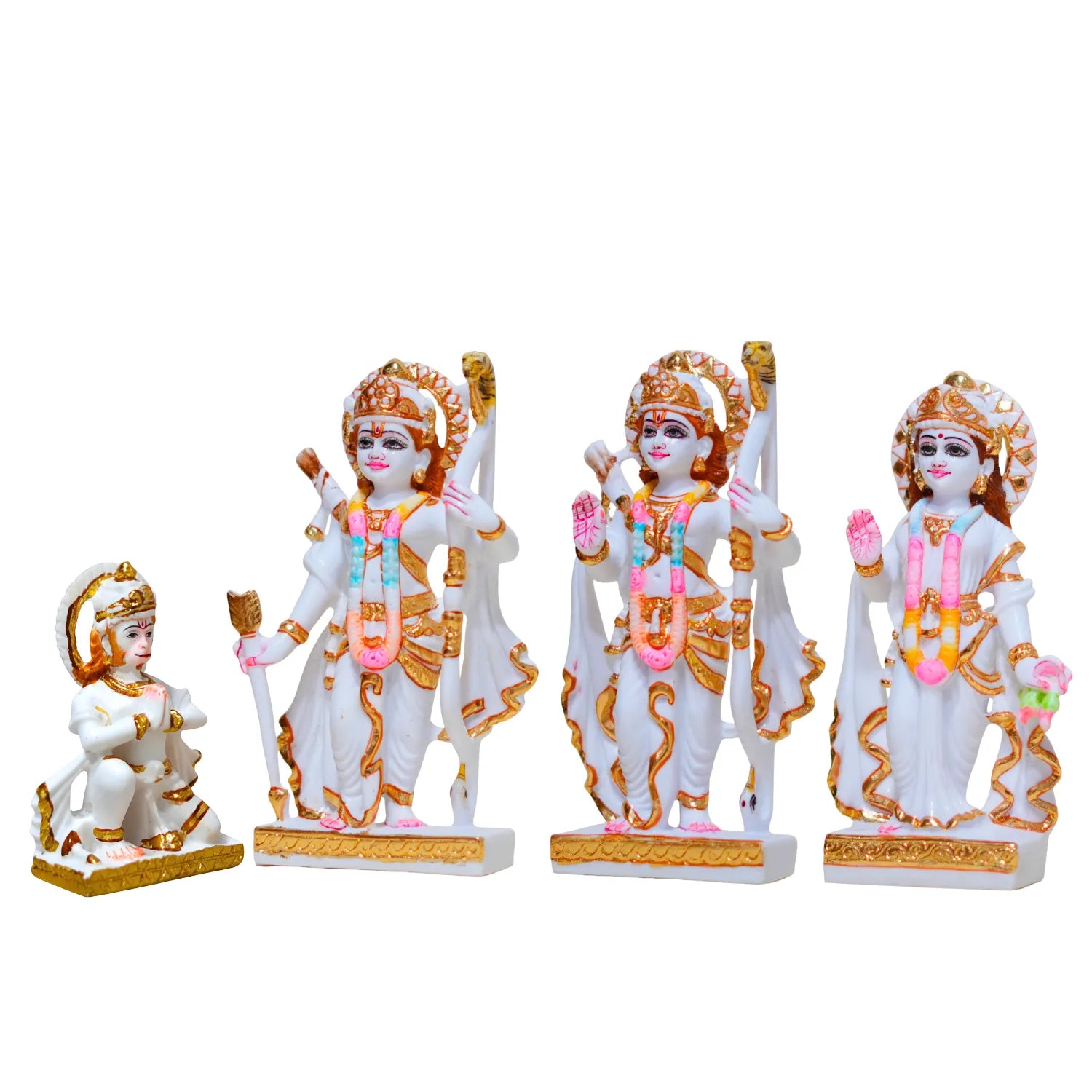 Set of four decorative statues with gold and pink accents on a white background