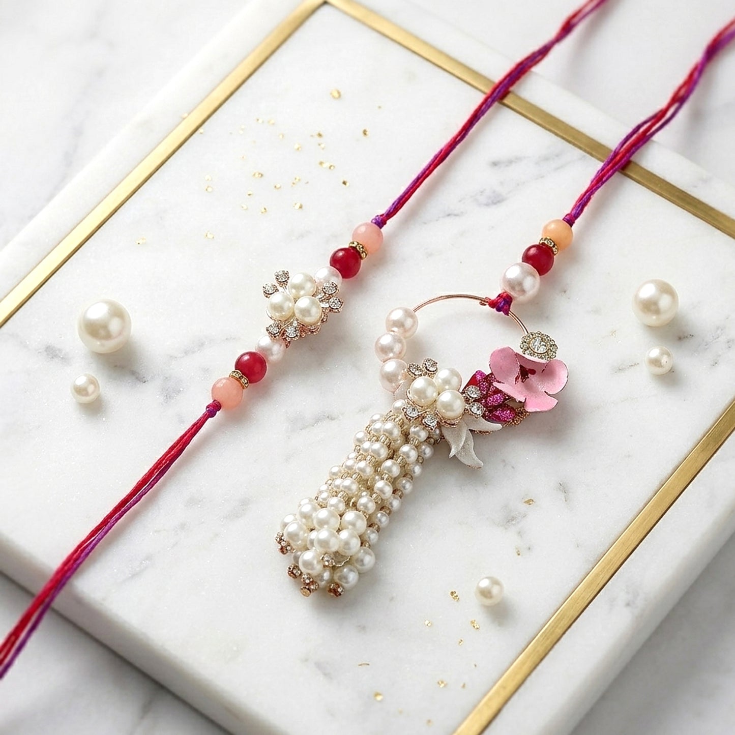 Elegant Pearl Floral Bhaiya Bhabhi Lumba Rakhi Set with Tassel & Pink Crystal Design