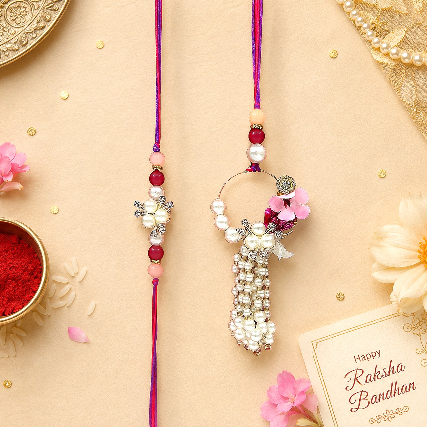 Elegant Pearl Floral Bhaiya Bhabhi Lumba Rakhi Set with Tassel & Pink Crystal Design