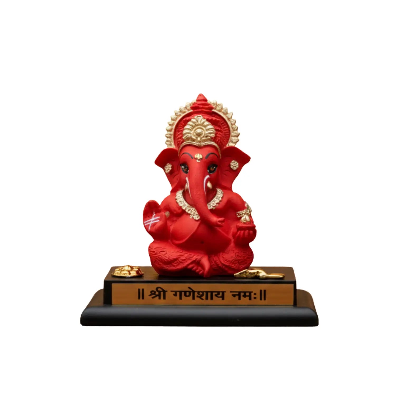 Red Ganesha statue on a black base with gold accents on a white background
