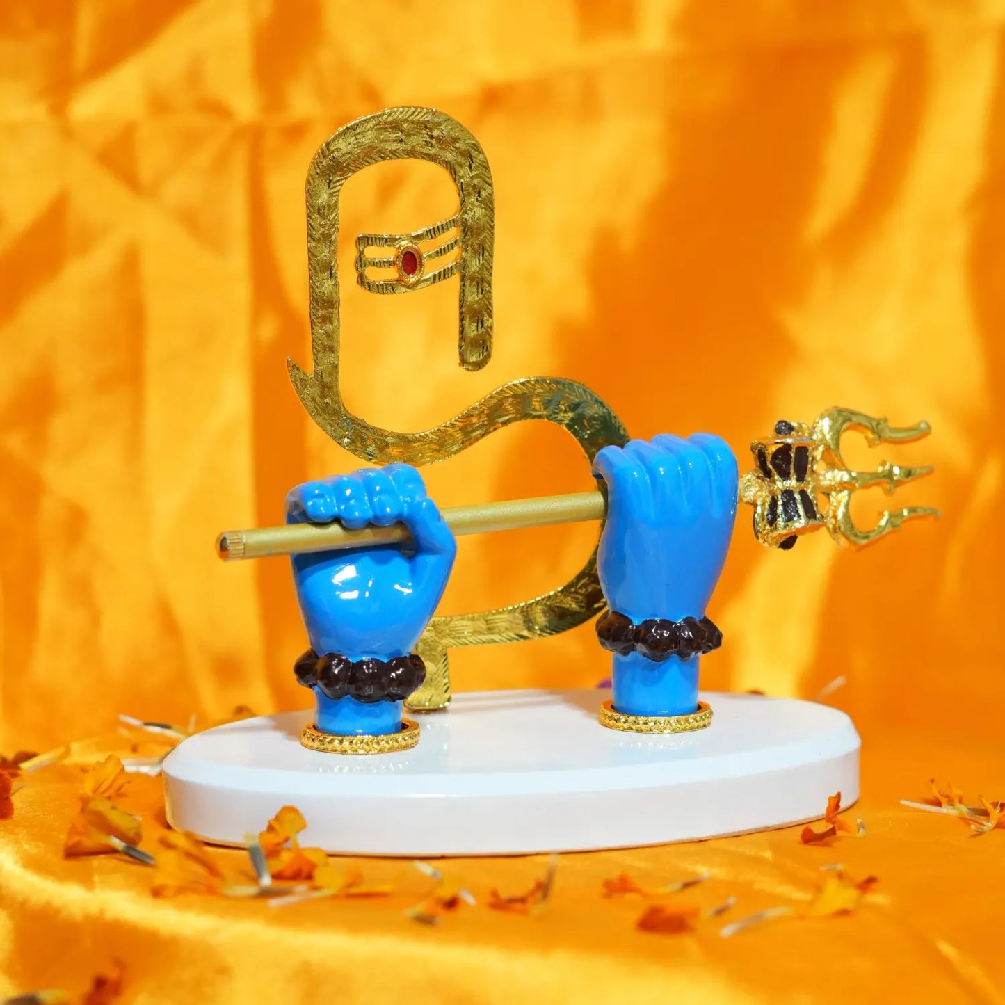 Decorative figurine with blue hands holding a gold weapon on an orange background