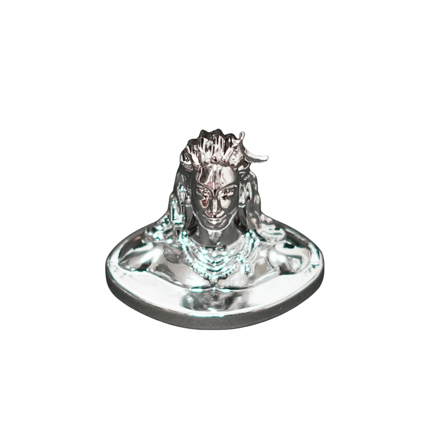 Metallic figurine of a deity on a white background