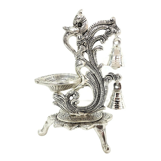 Top angle showing diya placement area on peacock diya stand