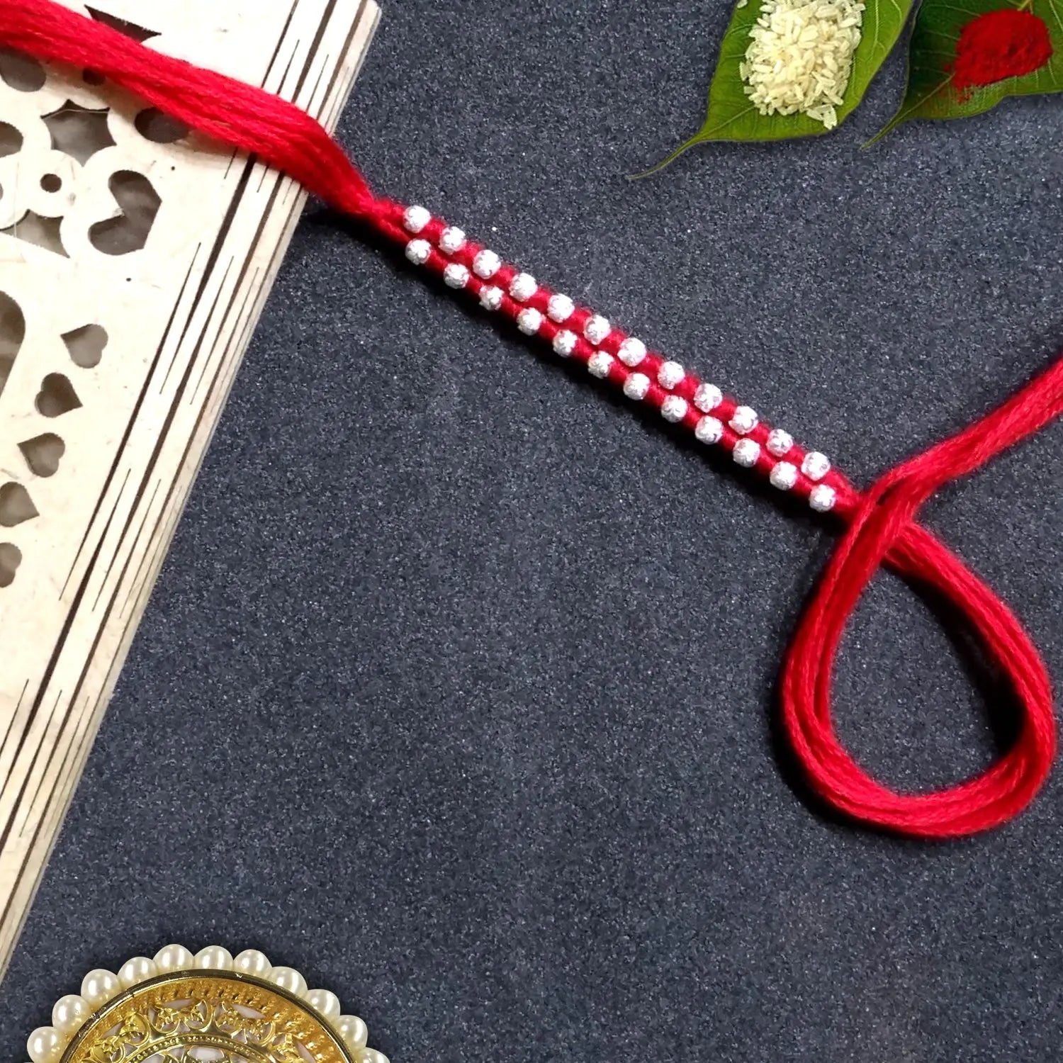 Silver Red Dora Rakhi  By Upharkaro-Upharkaro