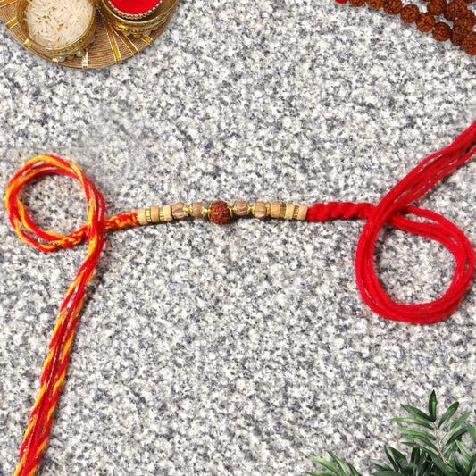 Stylish Golden Beads Red Dora Rakhi by Upharkaro-Upharkaro