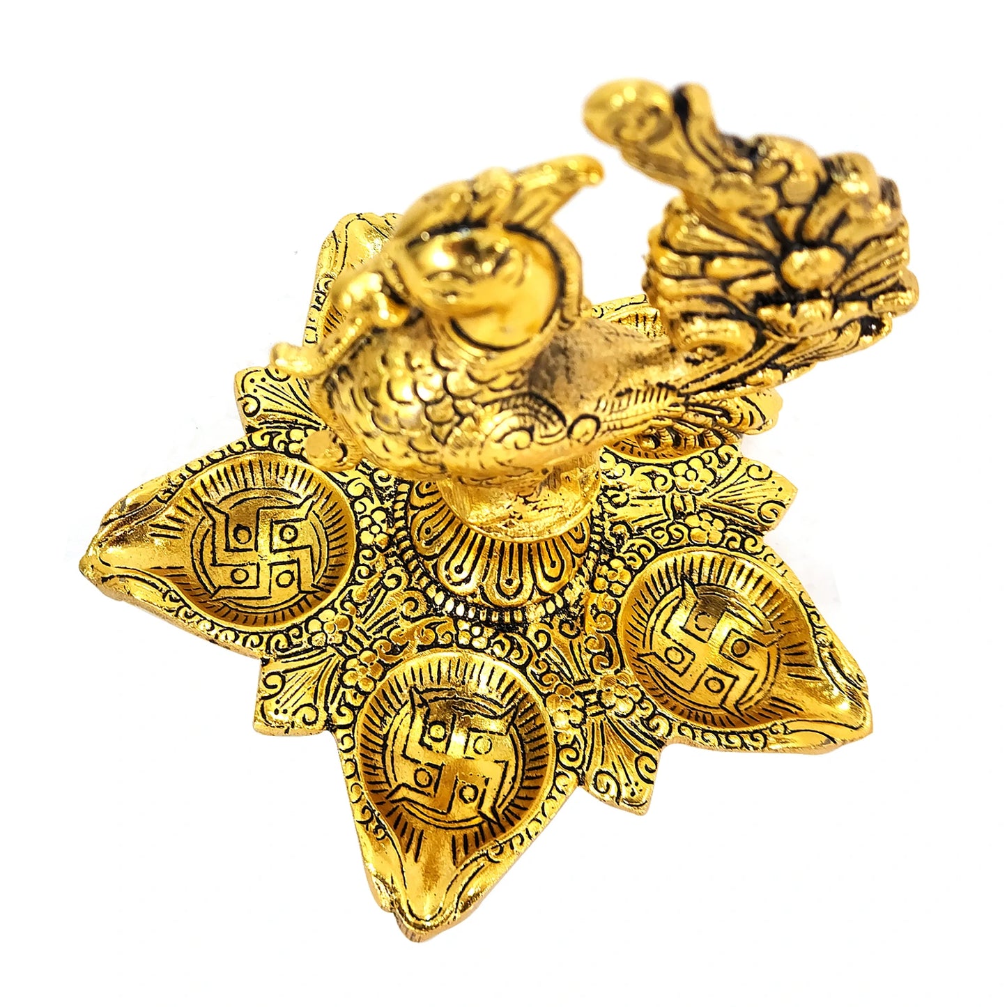 Gold decorative item with intricate designs on a white background