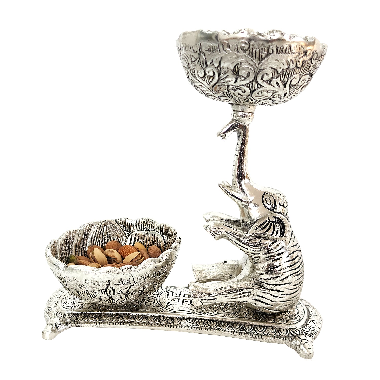 Decorative silver bowl with a dolphin design on a white background