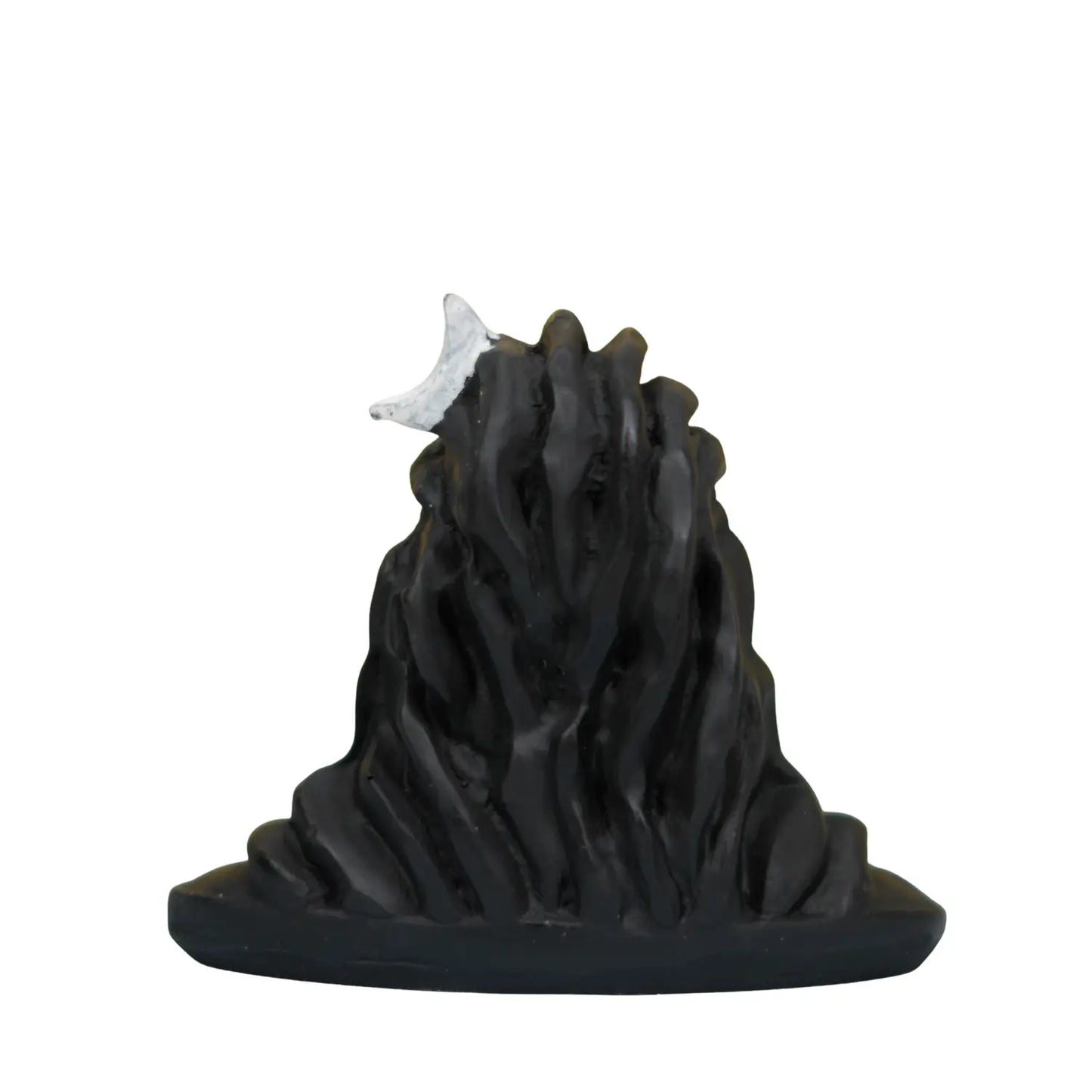 Black mountain-like sculpture with a small white object on top against a white background