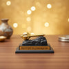 Upharkaro Golden Gada of Lord Hanuman on Black Base – Bajrangbali Power Symbol for Home, Office & Car Dashboard By Upharkaro