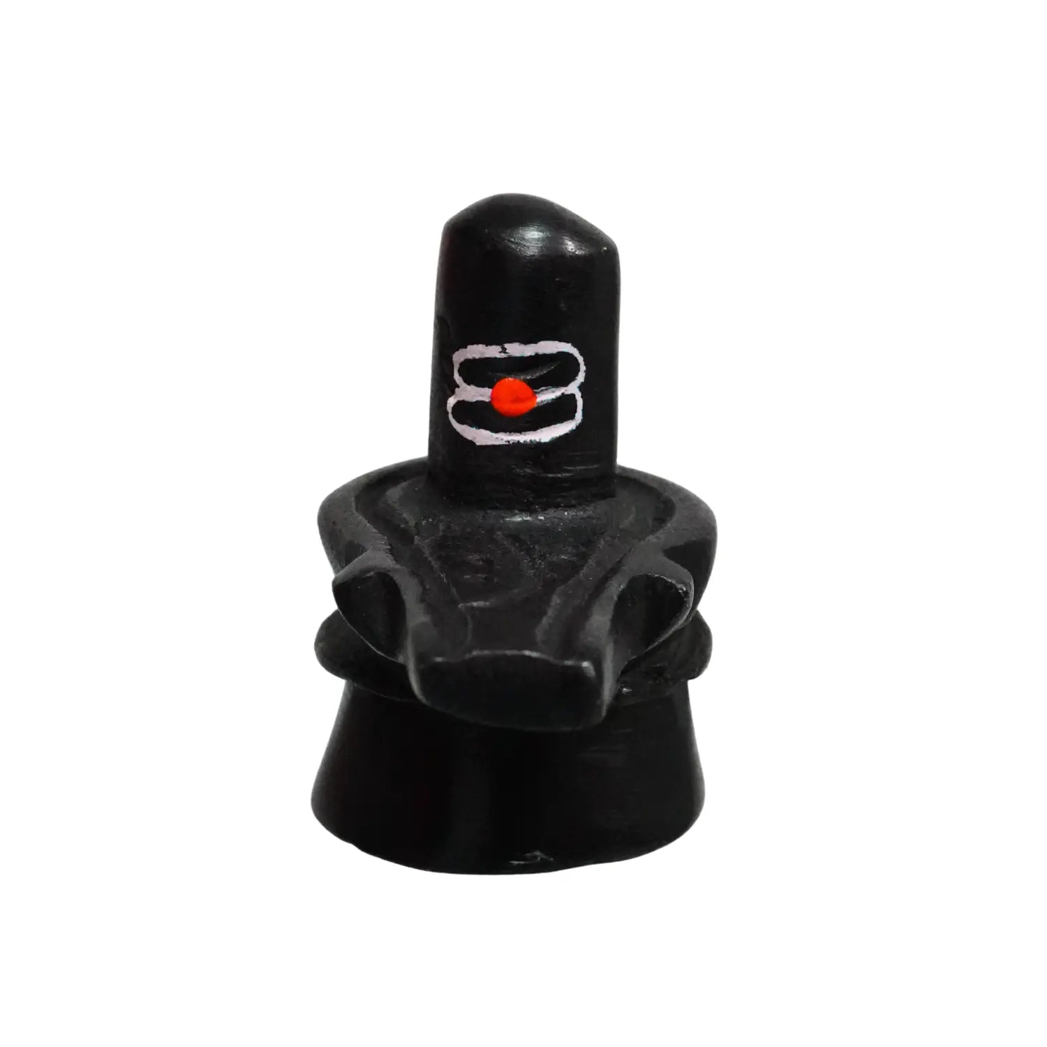 Black stone idol with a red dot on a white background