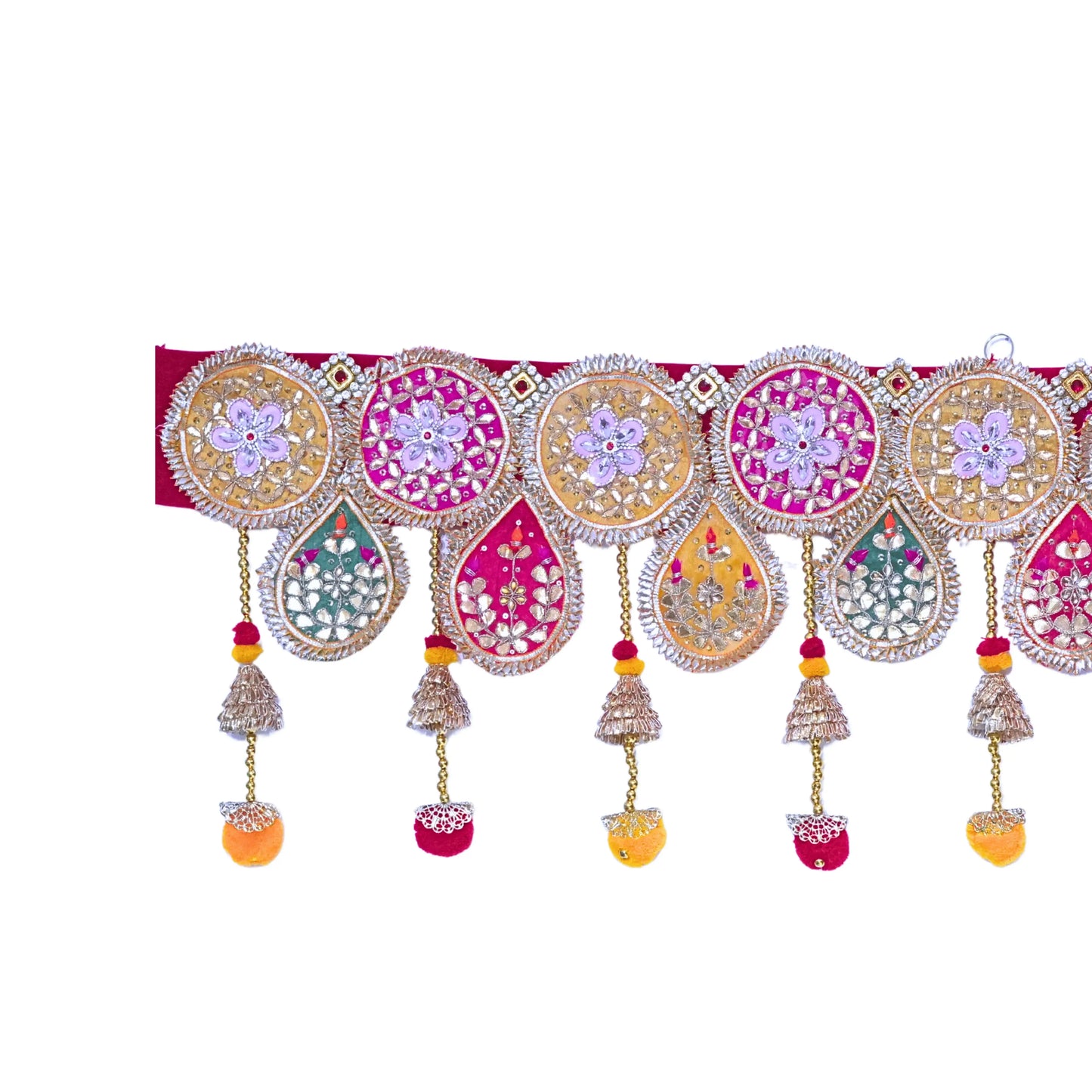 Decorative toran with colorful patterns and hanging elements on a white background