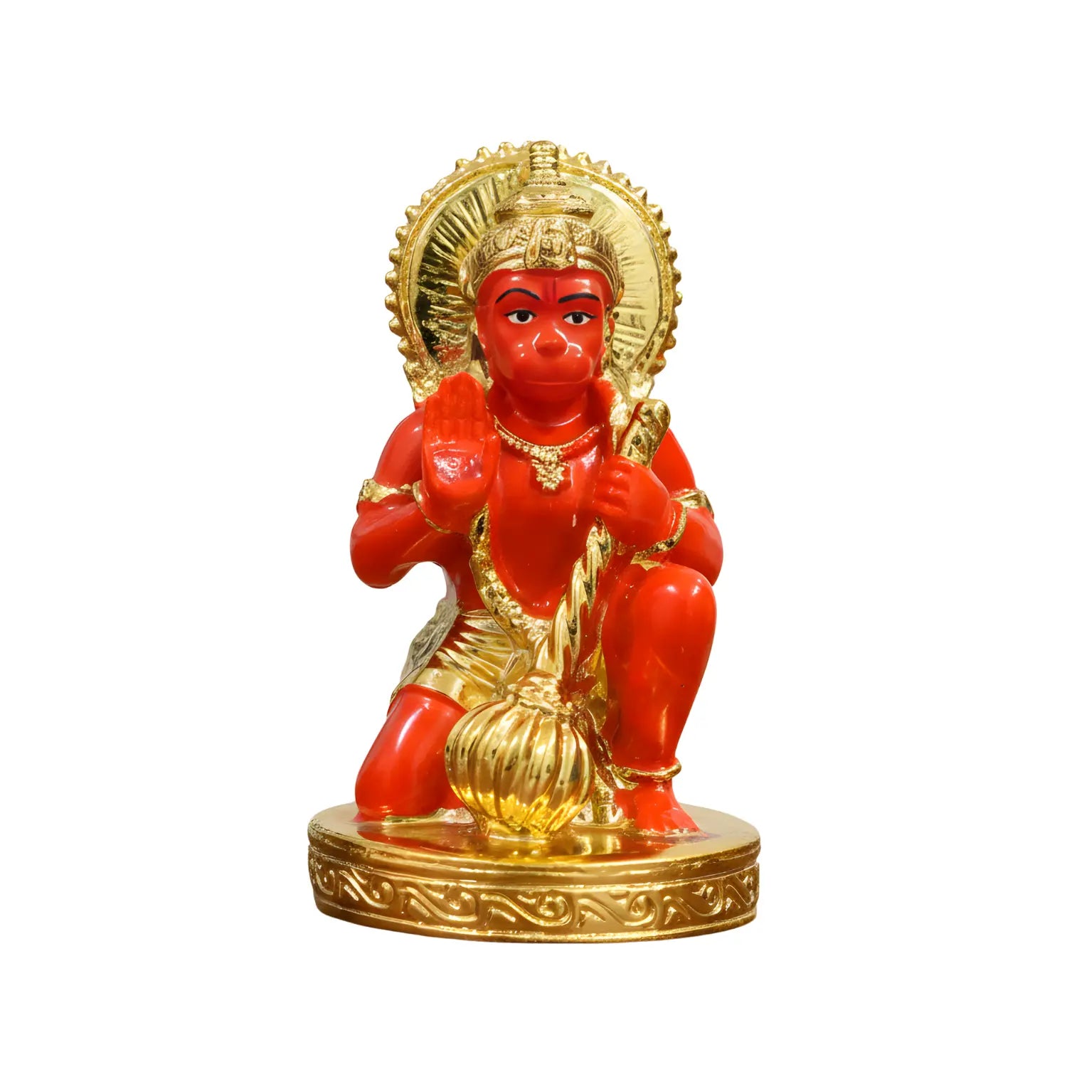 Red and gold statue of a seated figure on a white background
