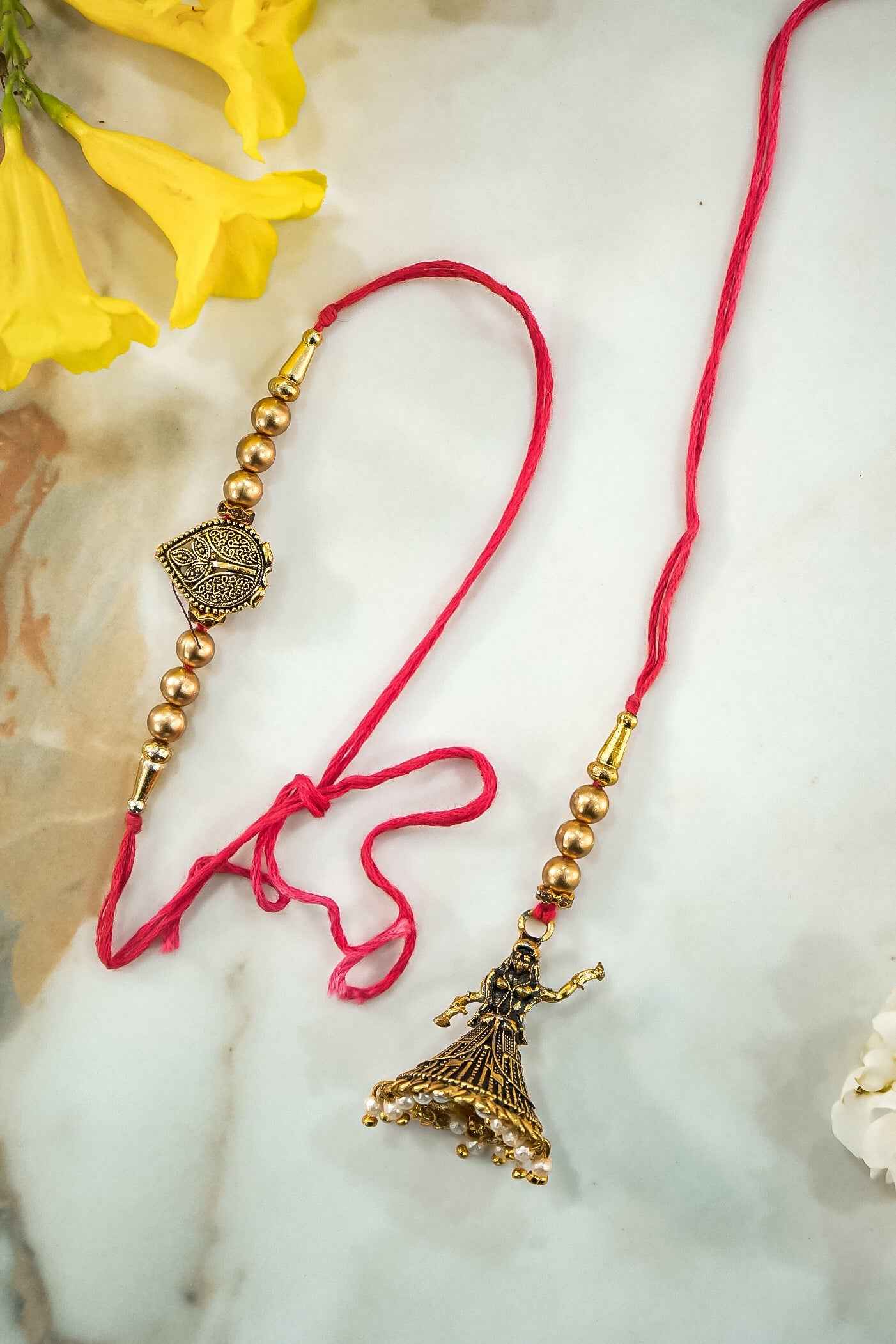 Elegant Dolls & Pearl Hanging Lumba Rakhi for Bhabhi – Traditional Rakhi Design by Upharkaro-Upharkaro