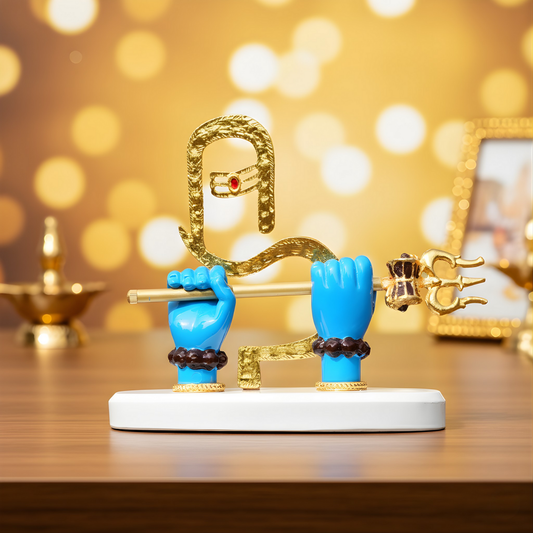 Decorative figurine with blue hands holding a gold snake against a blurred golden background