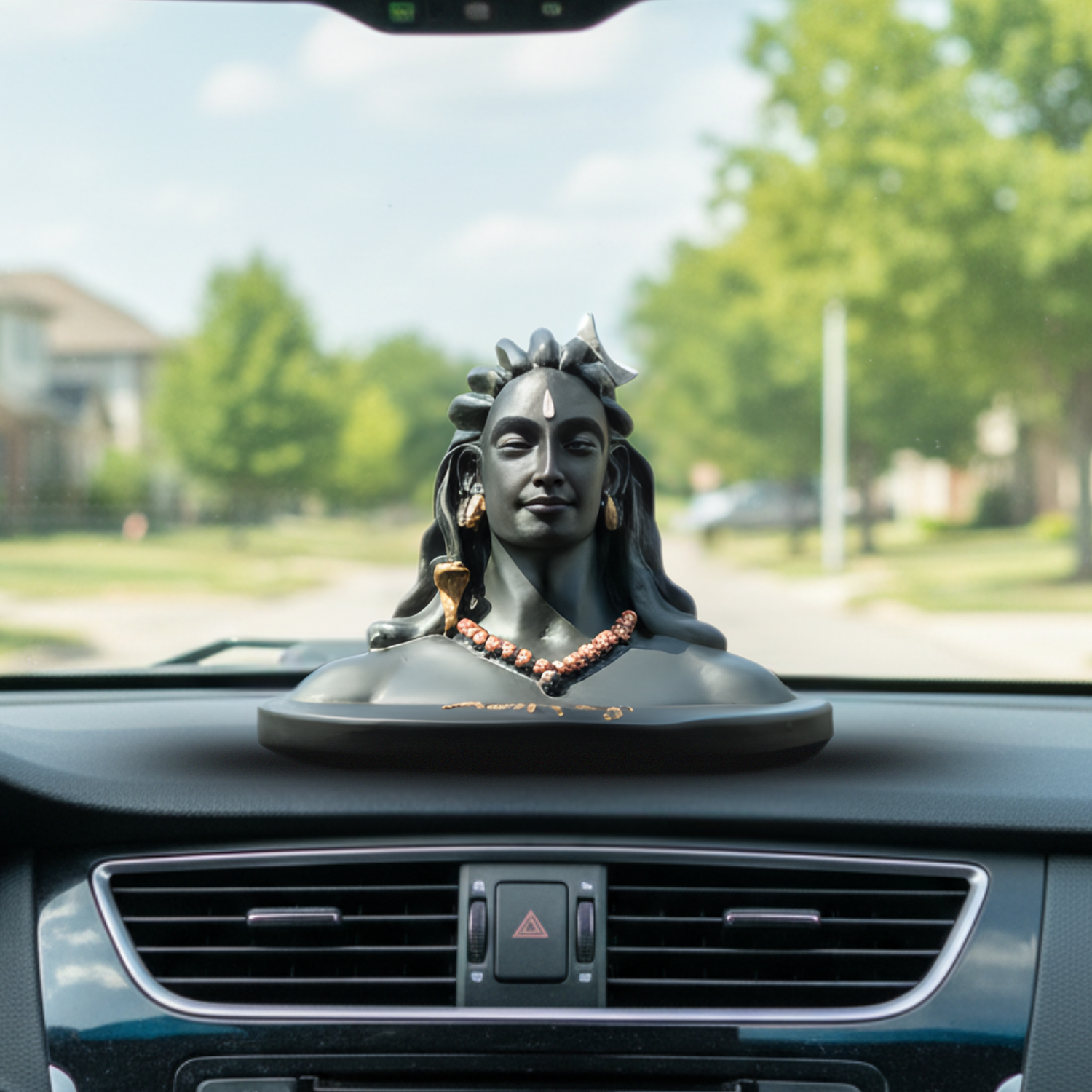 adiyogi car dashboard statue in car