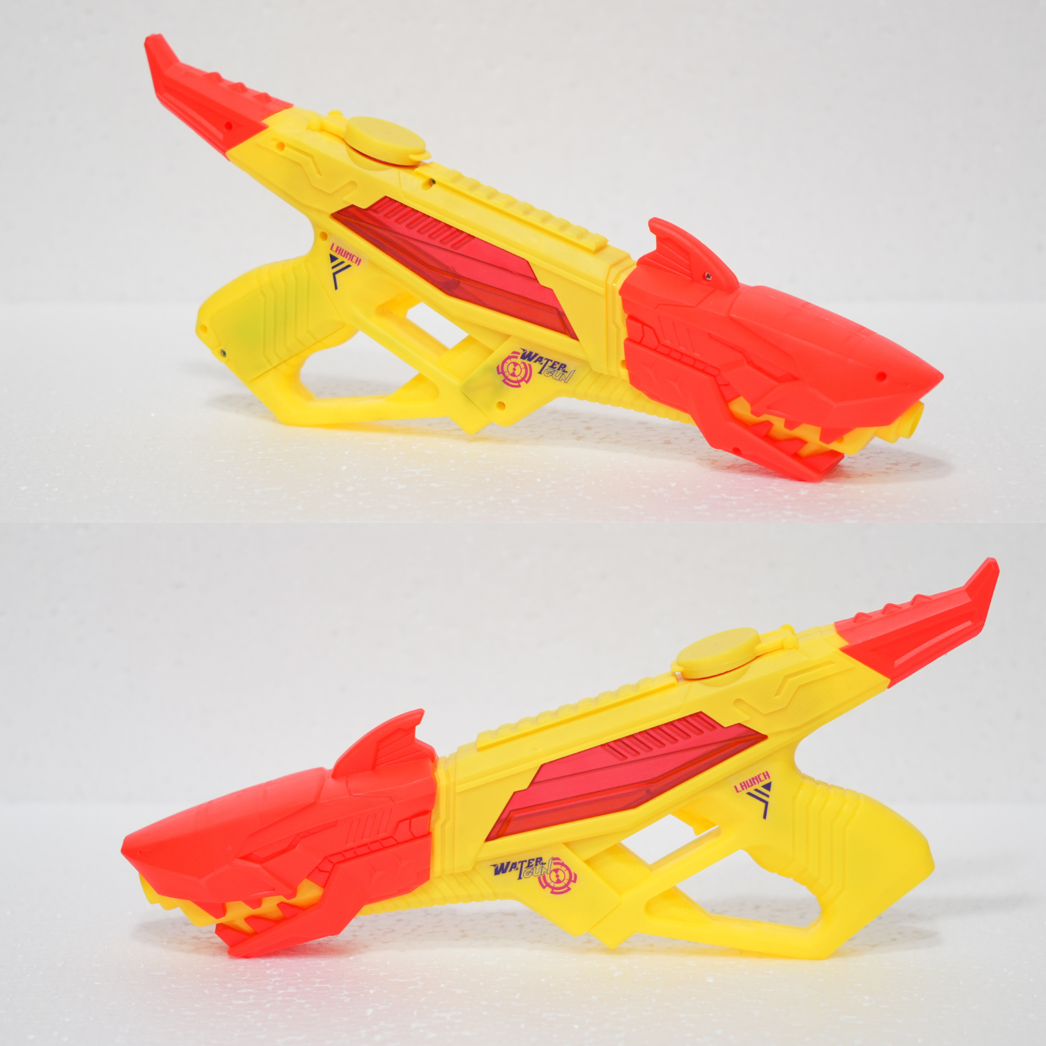 Two yellow and red toy blasters on a white background