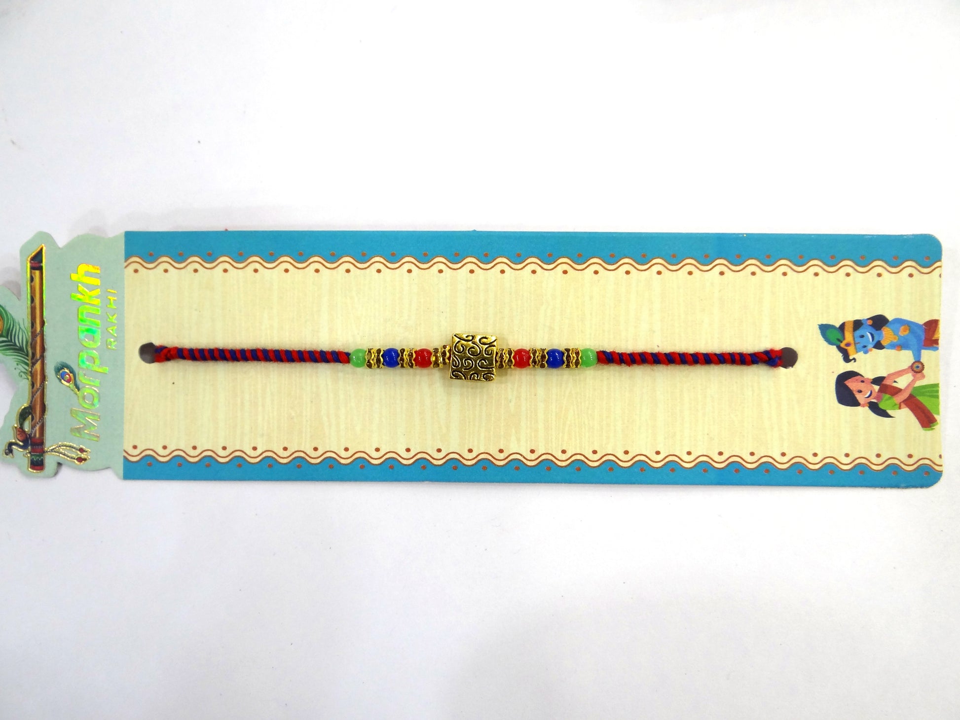 Gold Plated Multi-Colour Dora Rakhi for Brother – Traditional Rakhi with Stylish Thread Design, Elegant Beads & Festival Vibes | Upharkaro Rakhi 2024 Collection-Upharkaro