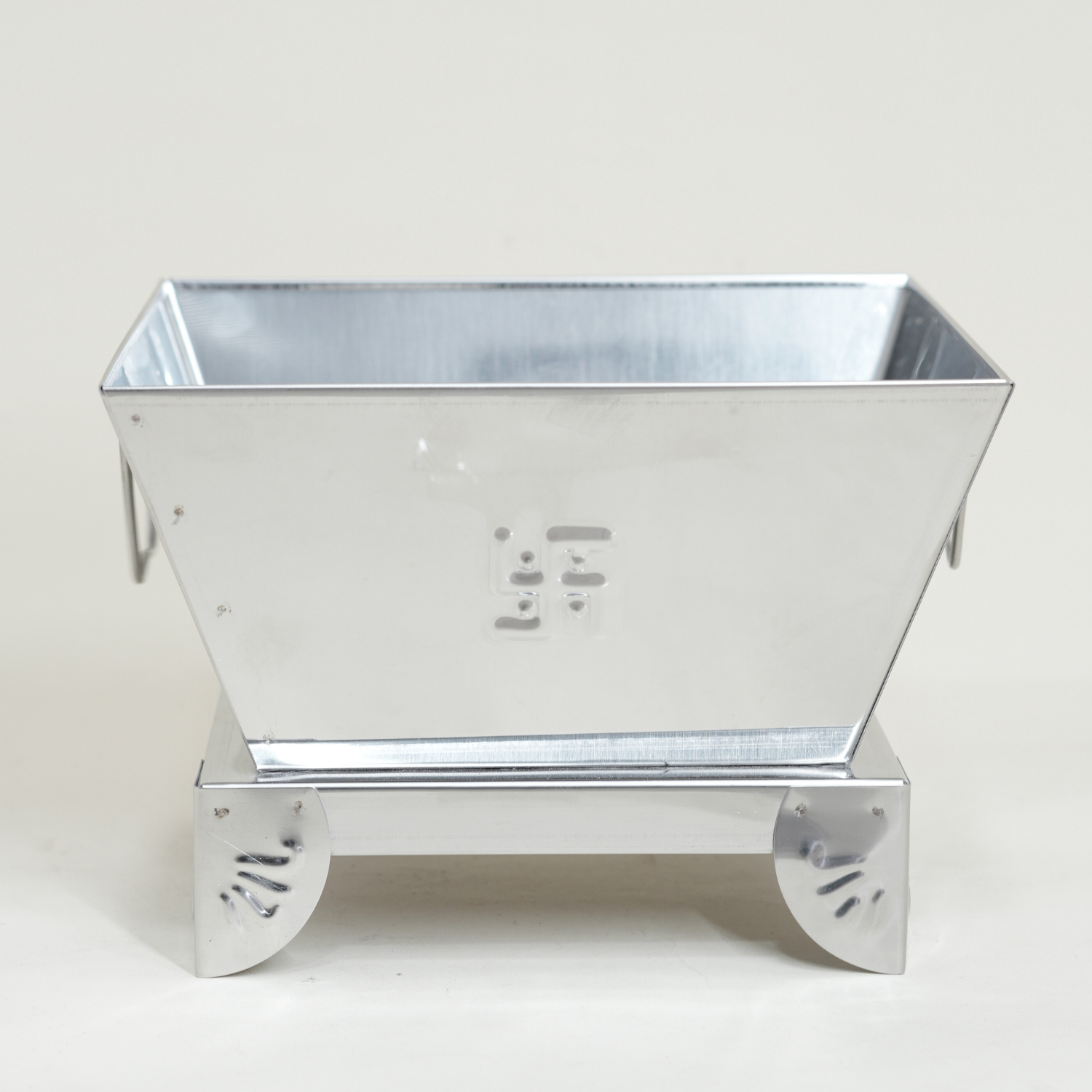 Metal planter box with 'Boma' branding on a white background