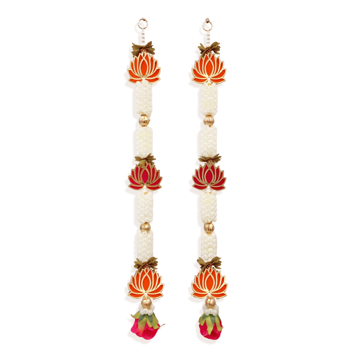 Pair of earrings with floral designs on a white background