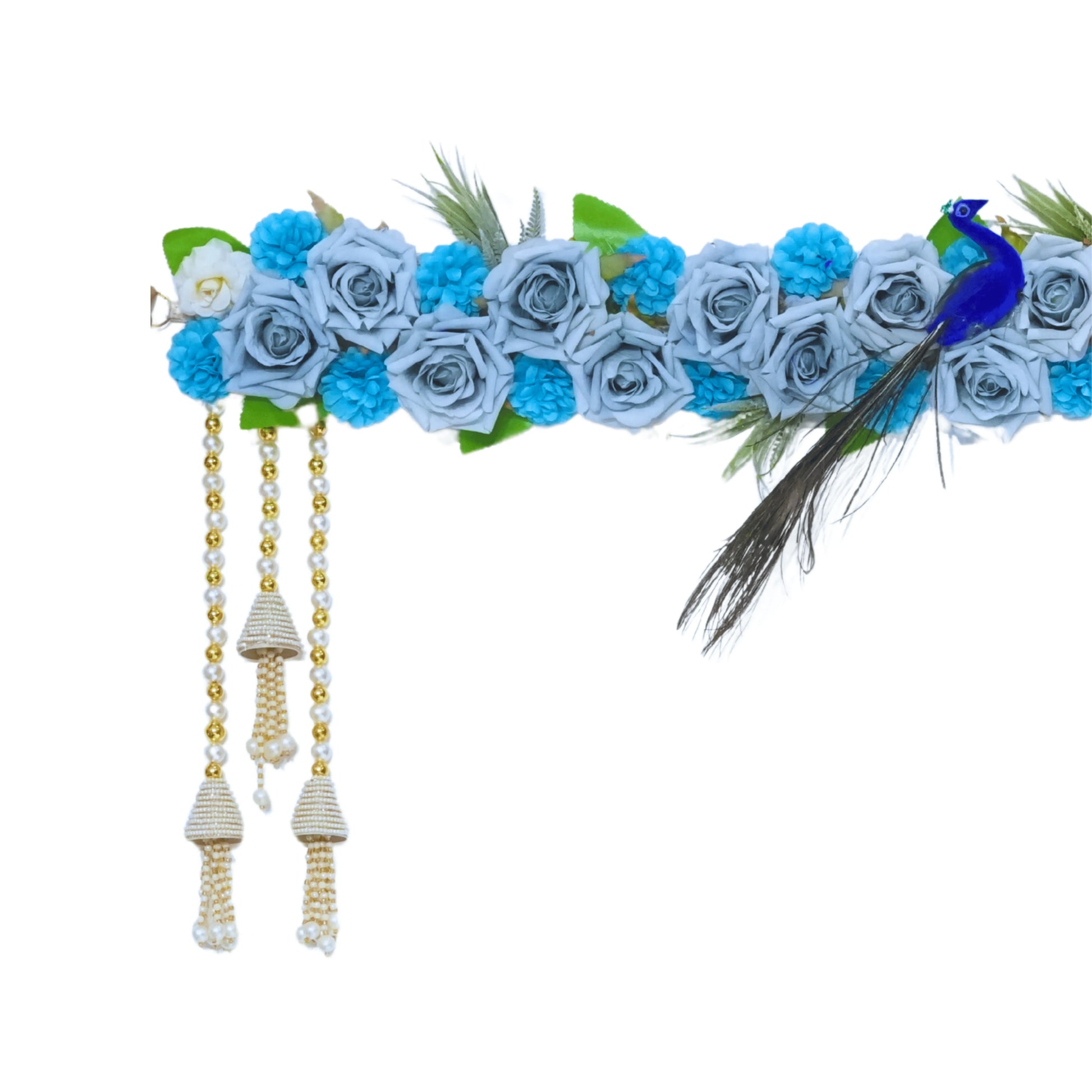 Decorative headband with blue and gray flowers, green leaves, and peacock feather on a white background