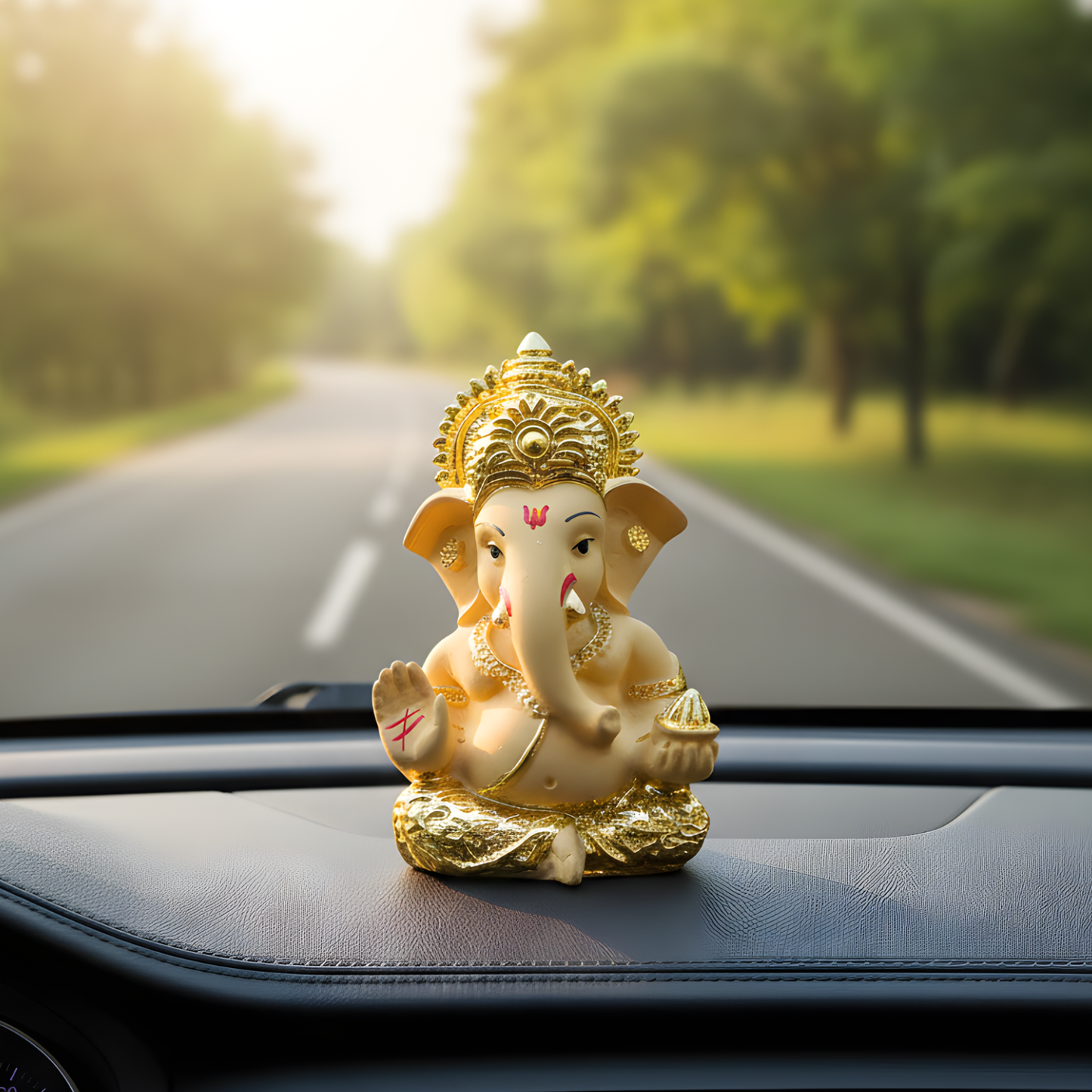 Decorative figure of a神灵 on a car dashboard with a road and trees in the background