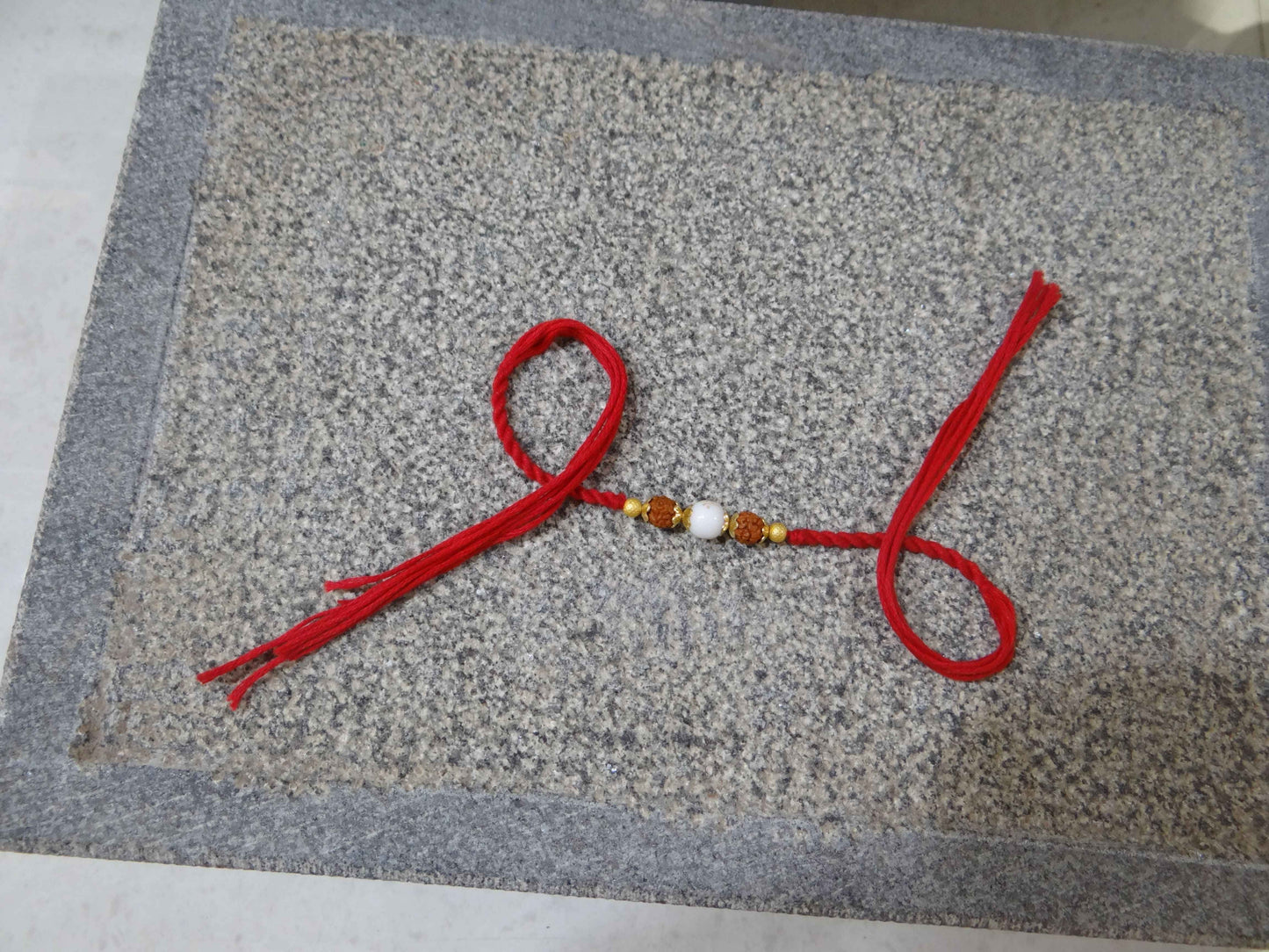 White Stone Rudraksh  Dora Rakhi By Upharkaro-Upharkaro
