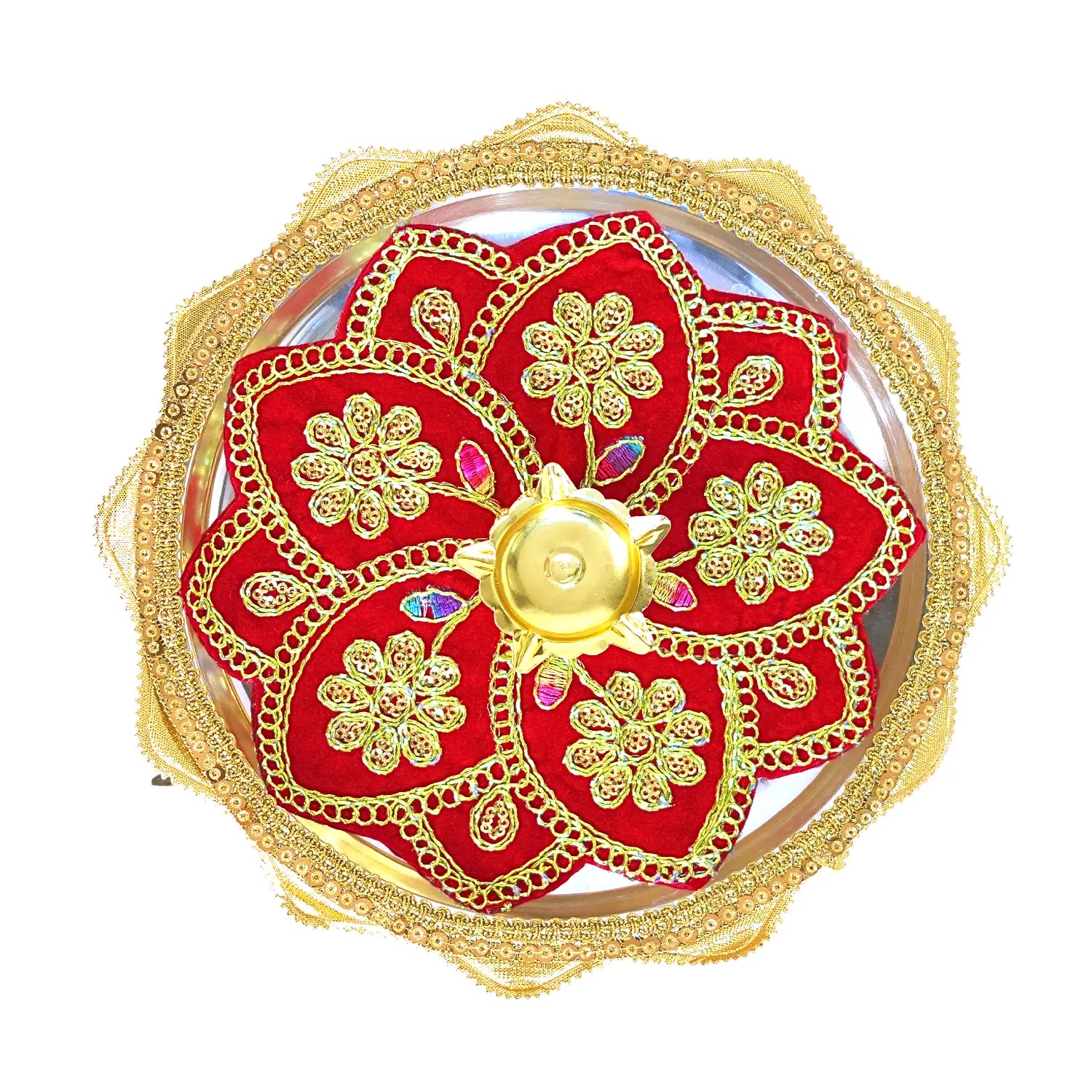 Decorative red and gold plate with intricate designs on a white background